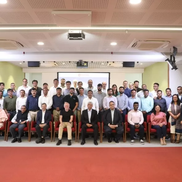 Participants and guests pose after the session
