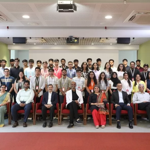 Participants and guests pose after the session