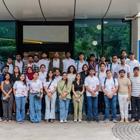 Participants pose for group photo