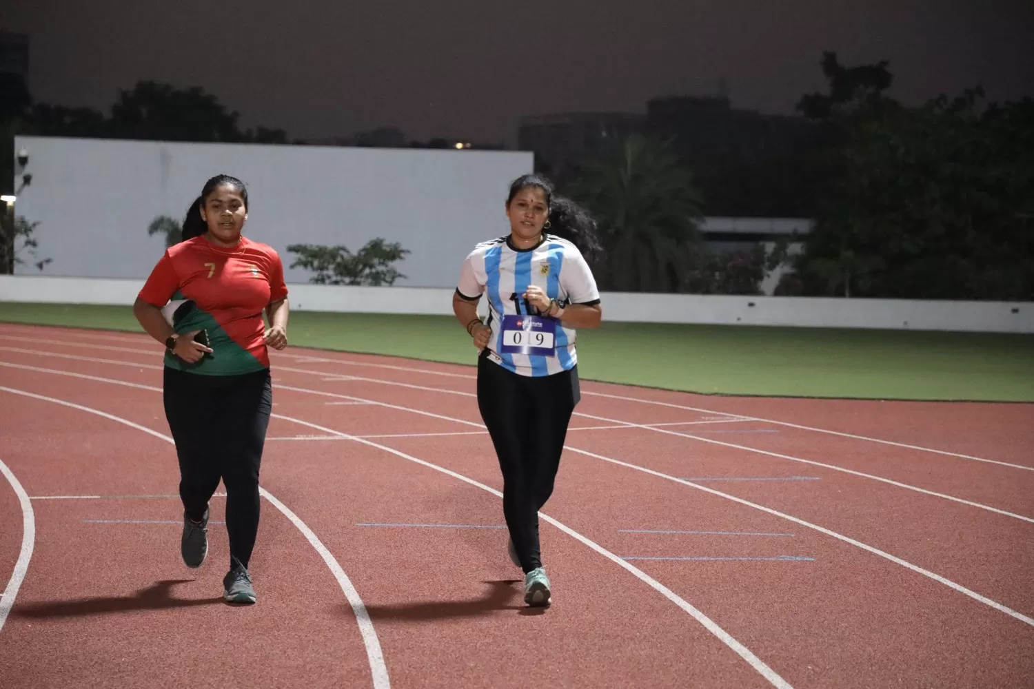 Participants running in the track