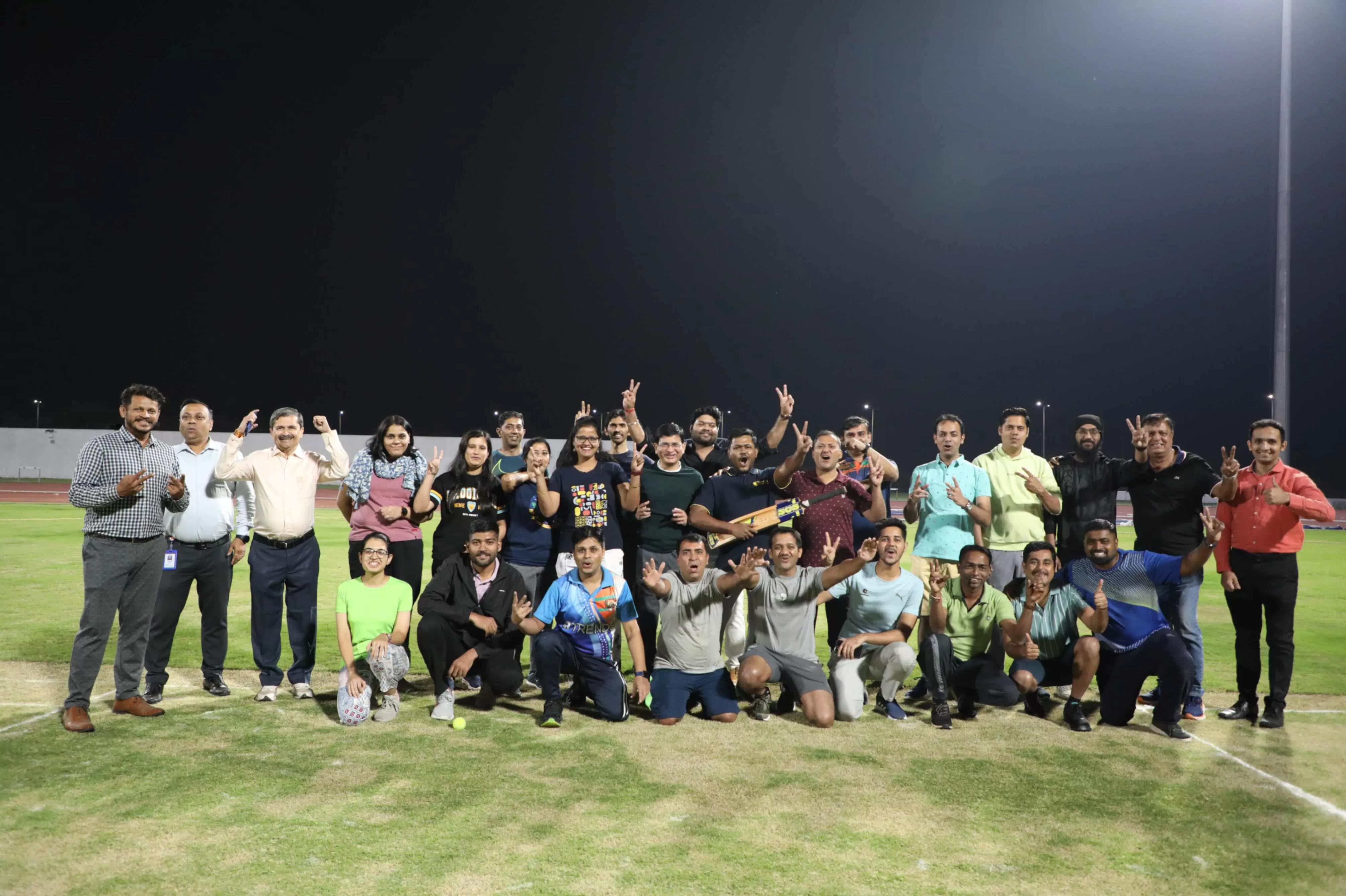 End of cricket match and pose for photograph